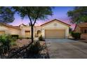Charming single-story home with desert landscaping, two car garage and beautiful curb appeal at 1904 Bellview St, Las Vegas, NV 89134