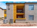 Apartment building featuring multiple units, small balconies, and desert-friendly xeriscaping at 2700 N Rainbow Blvd # 1080, Las Vegas, NV 89108