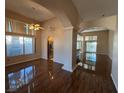 Spacious living room with hardwood floors, recessed lighting, and large windows at 3136 Jane Austin Ave, North Las Vegas, NV 89031