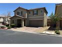 Inviting two-story home with a two car garage and cozy front porch at 3855 Park Field Dr, Las Vegas, NV 89120