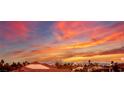 Striking sunset view over the Las Vegas skyline, with the High Roller and resorts silhouetted against a vibrant sky at , Las Vegas, NV 89117