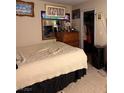 Bedroom featuring a mirror, closet, and neutral colors at 1001 Declaration Dr, Las Vegas, NV 89110