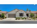 Charming single-story home with a well-manicured lawn, desert landscaping, and inviting curb appeal at 10608 Trussell St, Las Vegas, NV 89141