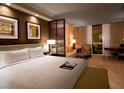Cozy bedroom features a comfortable king-size bed, warm lighting, and modern artwork at 135 E Harmon Ave # 518, Las Vegas, NV 89109
