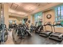 Well-equipped gym with treadmills, elliptical machines, and weightlifting equipment at 135 E Harmon Ave # 518, Las Vegas, NV 89109
