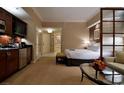 Upscale suite featuring a kitchenette, sitting area, and elegant decor at 135 E Harmon Ave # 518, Las Vegas, NV 89109