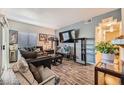 Relaxing living room featuring a comfortable sofa and a large TV, perfect for entertaining and relaxation at 2110 Los Feliz St # 1066, Las Vegas, NV 89156