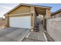The two-car garage has an automatic door, and leads to the home's gated entry at 27 Sirnoble St, Las Vegas, NV 89110