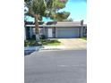 Charming single story home with mature shade tree and attached two car garage at 3660 Haverhill St, Las Vegas, NV 89121