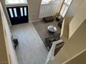 Open living room features hardwood floors, high ceilings, and lots of natural light at 3805 White Castle St, Las Vegas, NV 89129
