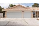 Spacious two-car garage with a wide driveway for extra parking at 5260 Styers St, North Las Vegas, NV 89031