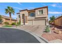 Charming two-story home with stone accents, balcony, and brick driveway at 7112 Rancho De Taos Ct, Las Vegas, NV 89130