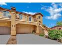 Well-maintained two-story townhome with a spacious garage and upper balcony at 1185 Via Dimartini, Henderson, NV 89052