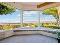 Bright sitting area with bench seating provides panoramic views of the beautiful desert landscape at 1409 Pueblo Dr, Boulder City, NV 89005