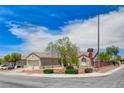 Desert-landscaped home situated on a corner lot with a two-car garage at 2804 Sapphire Desert Dr, Henderson, NV 89052