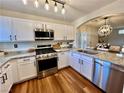 Well-equipped kitchen featuring stainless steel appliances and stylish countertops at 6699 Oxendale Ave, Las Vegas, NV 89139