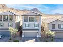 Modern two-story home with a balcony, two car garage and mountain views at 1323 Cerulean Ave, Henderson, NV 89002
