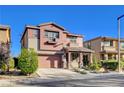 Charming two-story home with a well-maintained front yard and inviting entryway at 5434 Fawn Chase Way, Las Vegas, NV 89135