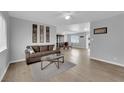 Bright living room with wood floors, modern decor, and an open layout at 721 Carpenter Dr, Las Vegas, NV 89107