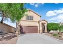 Charming two-story home featuring a well-maintained yard with a two car garage and desert landscaping at , North Las Vegas, NV 89031