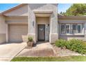 Charming single-story home featuring a welcoming front entrance and well-maintained landscaping at 1088 Casady Hollow Ave, Henderson, NV 89012
