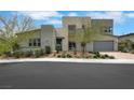 Contemporary home showcasing well-maintained landscaping and a brick-paved driveway leading to an attached garage at 3005 Merlesco Ave, Henderson, NV 89044