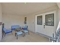 Inviting covered patio with comfortable seating, perfect for outdoor entertaining and relaxation at 3396 Montessouri St, Las Vegas, NV 89117