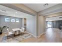 Bright dining room with a modern table set, complementing the home's sleek, open design at 7572 Mount Spokane Ct, Las Vegas, NV 89113