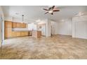 Open-concept kitchen featuring a center island, stainless steel appliances, and ample cabinet space at 9452 Plover Falls Ave, Las Vegas, NV 89149
