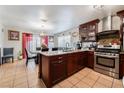 Well-equipped kitchen with stainless steel appliances and granite countertops at 2307 Tuscarora Ct, Las Vegas, NV 89142