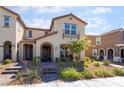 Charming two-story home with well-manicured landscaping and inviting curb appeal in a desirable neighborhood at 3221 Pergusa Dr, Henderson, NV 89044