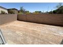 Discover a blank canvas in the backyard, perfect for creating your ideal outdoor living space at 3389 La Cura Ave # Lot 43, Las Vegas, NV 89141