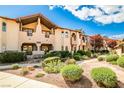 Charming exterior view with desert landscaping and a well-maintained facade at 4083 Nook Way # D, Las Vegas, NV 89103