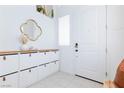 Bright foyer with modern shoe storage and a white front door, offering a clean, welcoming entrance at 7828 Bright Lodge St, Las Vegas, NV 89139