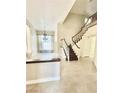 Grand entryway with high ceilings, a staircase, and natural light at 8397 San Ramon Dr, Las Vegas, NV 89147