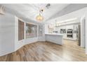 This dining area offers bright natural light and a view of the well-equipped kitchen at 9917 Arbuckle Dr, Las Vegas, NV 89134