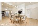 Cozy dining room adjacent to the kitchen is perfect for Gathering meals and gatherings at 10309 Georgetown Pl, Las Vegas, NV 89134