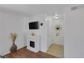 A staged entryway featuring a small fireplace at 526 Sellers Pl, Henderson, NV 89011