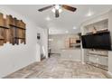 Bright living room showcases modern flooring, open layout with seamless flow to the kitchen, and a cozy atmosphere at 6581 Netherseal Ave, Las Vegas, NV 89139
