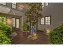 Picturesque courtyard featuring mature landscaping and a peaceful ambiance at 11503 Glowing Sunset Ln, Las Vegas, NV 89135