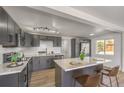 Modern kitchen features gray cabinetry, stainless appliances, and a center island at 1804 Pacific St, Las Vegas, NV 89104