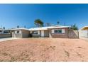 Charming single-story home with fresh exterior paint and rock landscaping at 1825 Howard Ave, Las Vegas, NV 89104