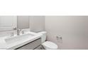 Bathroom featuring sleek vanity, modern faucet, and a minimalist design at 237 Paraggi Bay Dr, Henderson, NV 89011