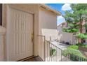Inviting front door and railing, complimented by desert landscaping at 5000 Red Rock St # 259, Las Vegas, NV 89118