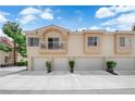 Inviting multi-Gathering home featuring garages, a balcony, and desert landscaping at 5000 Red Rock St # 259, Las Vegas, NV 89118