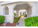 Inviting walkway with lush landscaping and covered entryway leading to the homes at 5201 S Torrey Pines Dr # 1221, Las Vegas, NV 89118