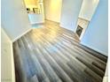 Open concept living room featuring wood-look flooring and lots of natural light at 5250 S Rainbow Blvd # 2029, Las Vegas, NV 89118