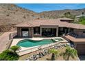 Backyard pool with a desert view provides a wonderful area for relaxation and enjoyment at 205 Red Rock Rd, Boulder City, NV 89005