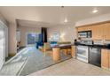 Open-concept living area with modern furnishings and balcony access at 211 E Flamingo Rd # 1617, Las Vegas, NV 89169