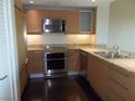 Contemporary kitchen with stainless steel appliances and granite countertops at 322 Karen Ave # 2606, Las Vegas, NV 89109